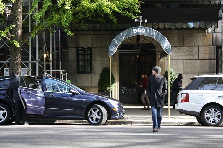 Paul Tudor Owen outside the building that was the model for the Peacocks' home